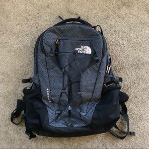 Dark gray women’s North face backpack
